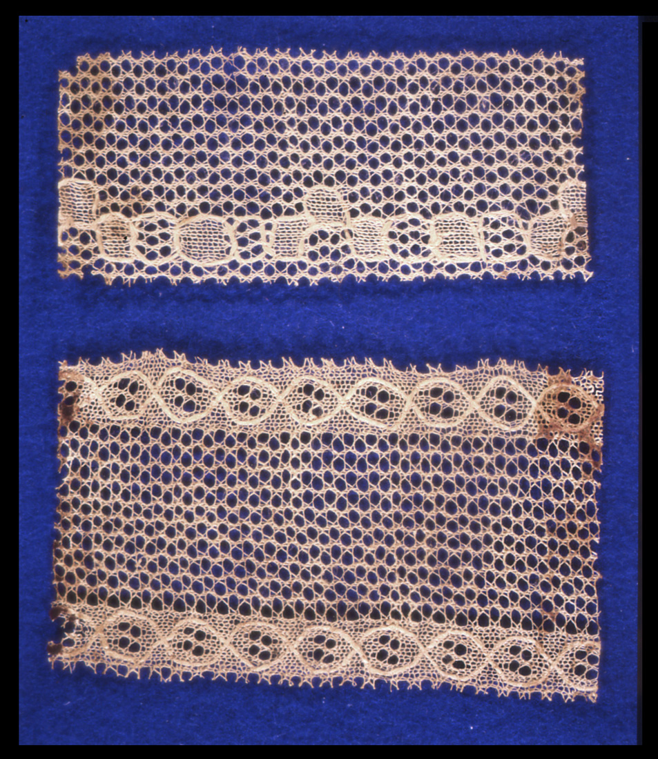 The earliest machine-made lace was made on the stocking-frame by transferring stitches to make a net. These two borders have a simple geometric pattern in plain knitting, net in transfer stitches and outlines put in by hand. Nottingham City Museums